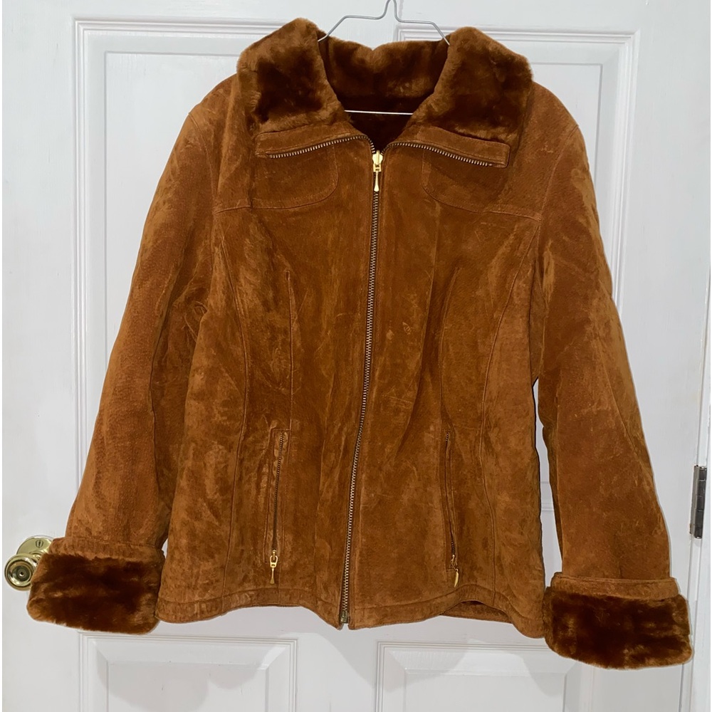 Selling this beautiful leather passport coat.